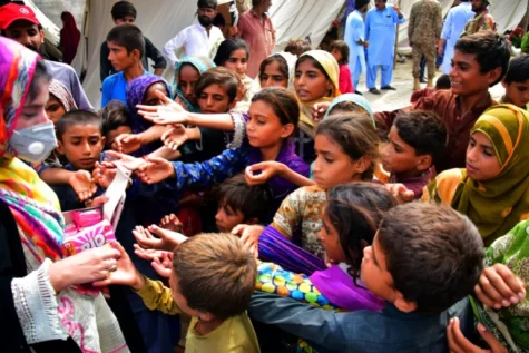 Line for relief made by children in Pakistan’s southwestern Balochistan province, Jaffarabad